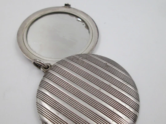 Women's pendant mirror. Sterling silver. Lines motifs. Tab clasp. 1970's