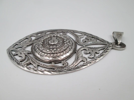 Women's pendant. Aztec calendar. Sterling silver. Ring on top. Mexico. 1980's