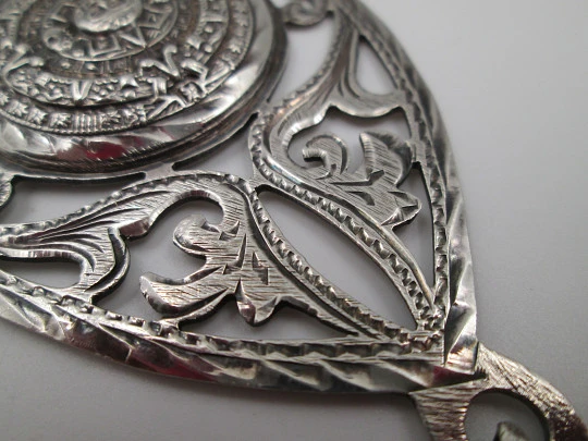 Women's pendant. Aztec calendar. Sterling silver. Ring on top. Mexico. 1980's