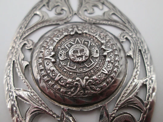 Women's pendant. Aztec calendar. Sterling silver. Ring on top. Mexico. 1980's