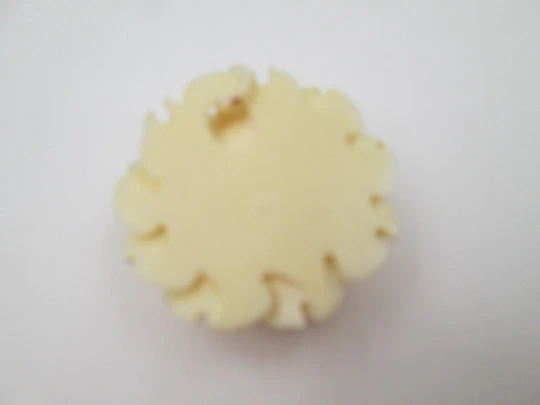 Women's pendant. Pretty ivory rose with open petals. Ring on top. Europe. 1950's