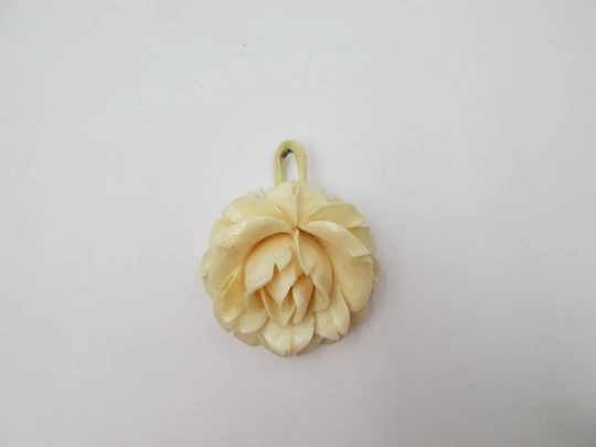 Women's pendant. Pretty ivory rose with open petals. Ring on top. Europe. 1950's