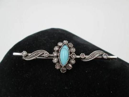 Women's pin brooch. Sterling silver, White sapphires & turquoise stone. 1980's