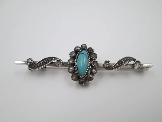 Women's pin brooch. Sterling silver, White sapphires & turquoise stone. 1980's