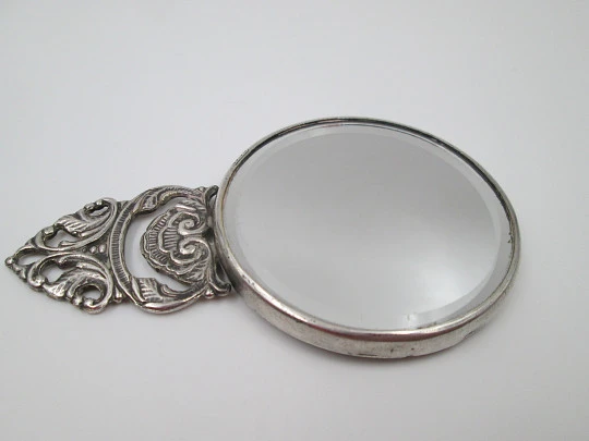 Women's pocket mirror. Silver plated metal. Dance scene. Openwork handle. Holland. 1950's
