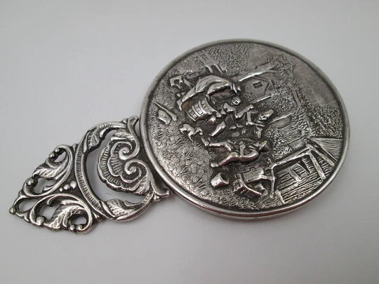 Women's pocket mirror. Silver plated metal. Dance scene. Openwork handle. Holland. 1950's