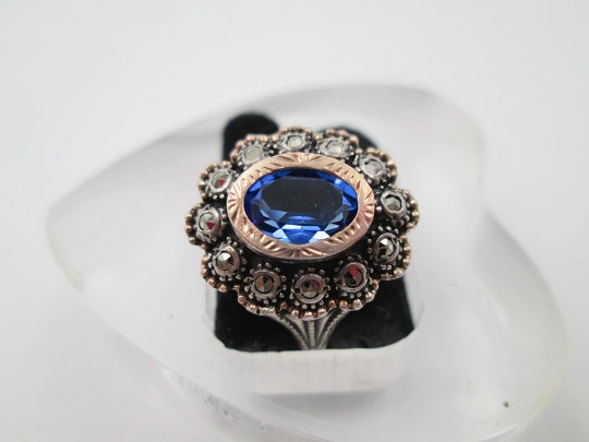 Women's ring. Sterling silver, marcasite and blue gem. Gold edge. 1980. Europe