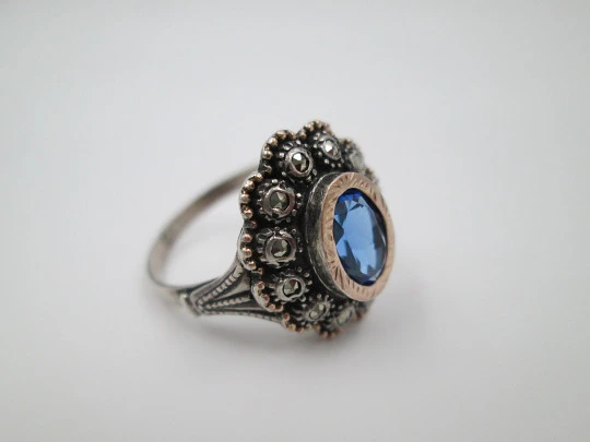 Women's ring. Sterling silver, marcasite and blue gem. Gold edge. 1980. Europe