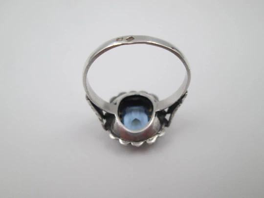 Women's ring. Sterling silver, marcasite and light blue gem. Gold edge. 1980