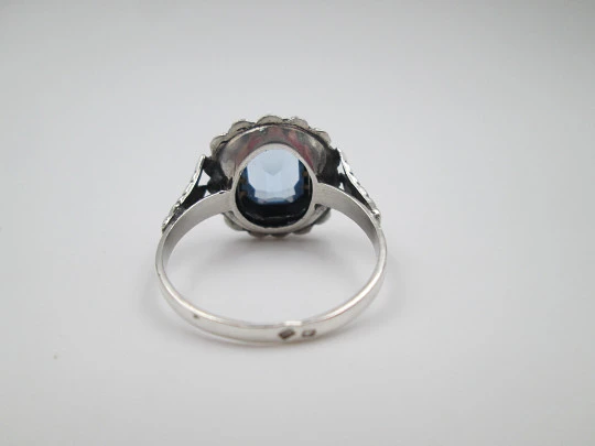 Women's ring. Sterling silver, marcasite and light blue gem. Gold edge. 1980