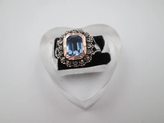 Women's ring. Sterling silver, marcasite and light blue gem. Gold edge. 1980