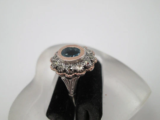 Women's ring. Sterling silver, marcasite stones and blue gem. Gold trims. Portugal. 1980's