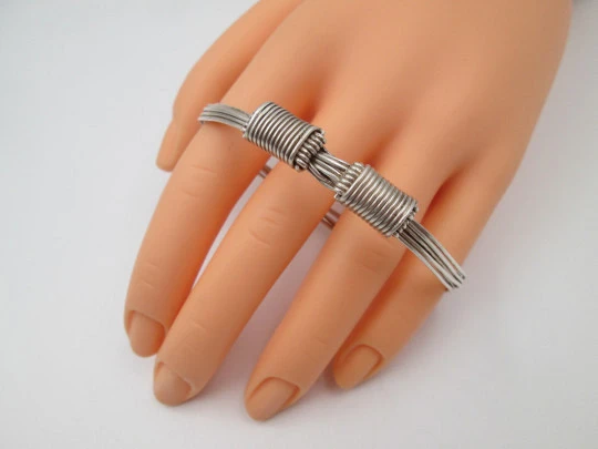 Women's seven-strand sterling silver knotted bracelet with adjustable clasp. 1990's. Spain Women's seven-strand sterling silver knotted bracelet with adjustable clasp. 1990's. Spain