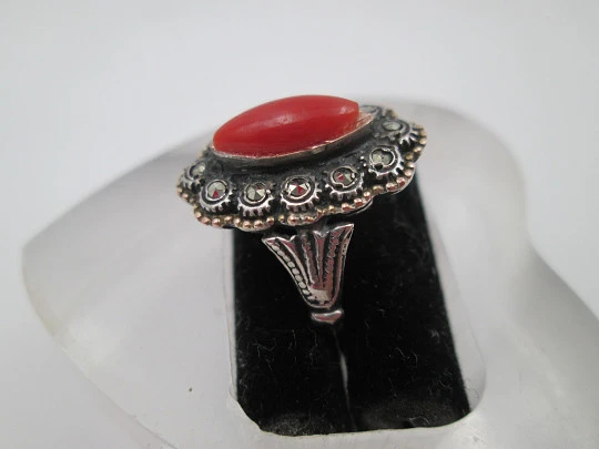 Women's shuttle ring. Sterling silver and gold edge. Marcasite and red coral. 1980. Europe