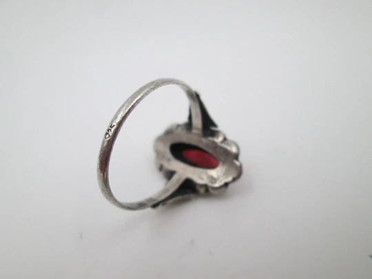 Women's shuttle ring. Sterling silver and gold edge. Marcasite and red coral. 1980. Europe