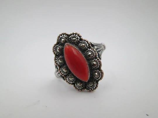 Women's shuttle ring. Sterling silver and gold edge. Marcasite and red coral. 1980. Europe