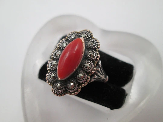 Women's shuttle ring. Sterling silver and gold edge. Marcasite and red coral. 1980. Europe