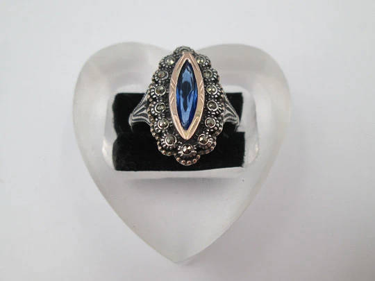 Women's shuttle ring. Sterling silver, marcasite stones and blue gem. Gold trims. Portugal