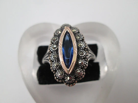 Women's shuttle ring. Sterling silver, marcasite stones and blue gem. Gold trims. Portugal