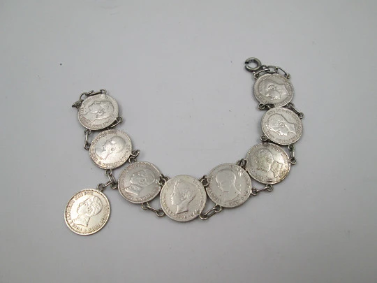 Women's spanish 50 cents coins  articulated bracelet with pendant. Sterling silver. 1900's