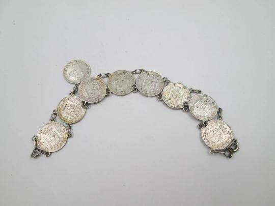 Women's spanish 50 cents coins  articulated bracelet with pendant. Sterling silver. 1900's