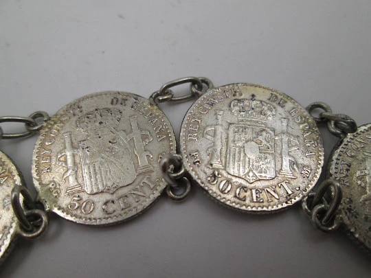 Women's spanish 50 cents coins  articulated bracelet with pendant. Sterling silver. 1900's