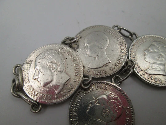 Women's spanish 50 cents coins  articulated bracelet with pendant. Sterling silver. 1900's