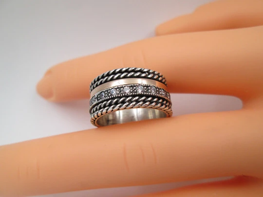 Women's spinner ring. Sterling silver and yellow gold. White gems. Portugal. 2000's Women's spinner ring. Sterling silver and yellow gold. White gems. Portugal. 2000's