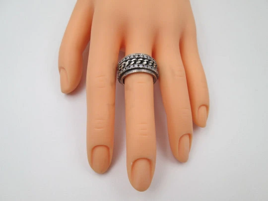 Women's spinner ring. Sterling silver. White gems & curb links motifs. Portugal. 2000's