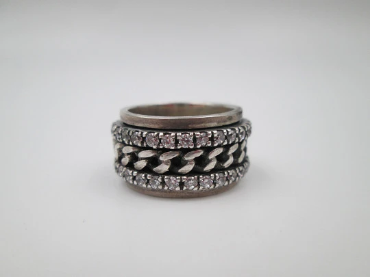 Women's spinner ring. Sterling silver. White gems & curb links motifs. Portugal. 2000's Women's spinner ring. Sterling silver. White gems & curb links motifs. Portugal. 2000's