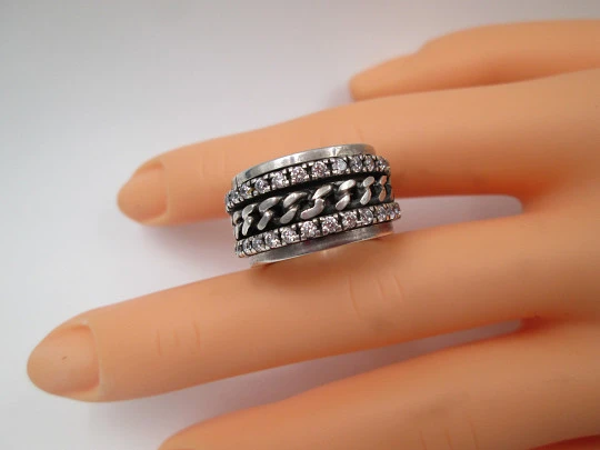 Women's spinner ring. Sterling silver. White gems & curb links motifs. Portugal. 2000's Women's spinner ring. Sterling silver. White gems & curb links motifs. Portugal. 2000's
