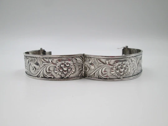 Women's sterling silver bangle bracelet. Floral and vegetable motifs. Tab security clasp. 1980 Women's sterling silver bangle bracelet. Floral and vegetable motifs. Tab security clasp. 1980
