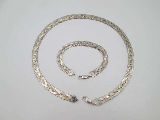 Women's sterling silver choker and braided bracelet set with herringbone design. Italy