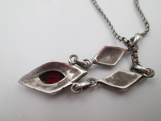 Women's sterling silver necklace and ring set. Marcasite stones, gold and garnet gems Women's sterling silver necklace and ring set. Marcasite stones, gold and garnet gems