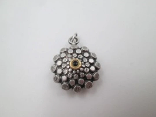 Women's Sun pendant. Sterling silver. Central hole. Rings top. 1970's