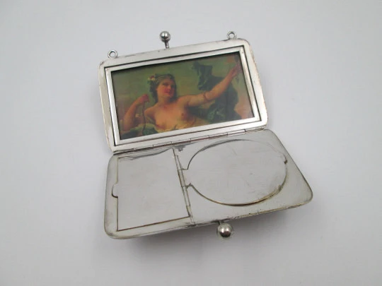 Women's vanity handbag. Silver plated metal. Linear pattern. Balls clasp. Europe. 1930's