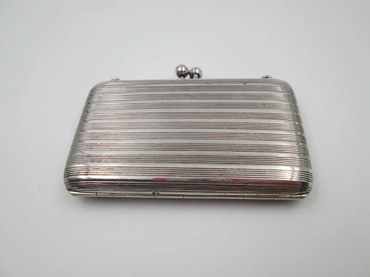 Women's vanity handbag. Silver plated metal. Linear pattern. Balls clasp. Europe. 1930's