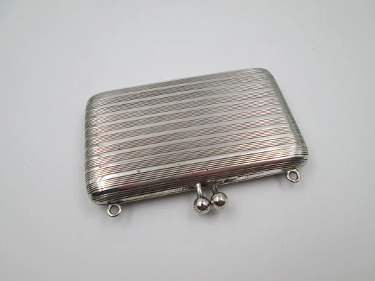 Women's vanity handbag. Silver plated metal. Linear pattern. Balls clasp. Europe. 1930's