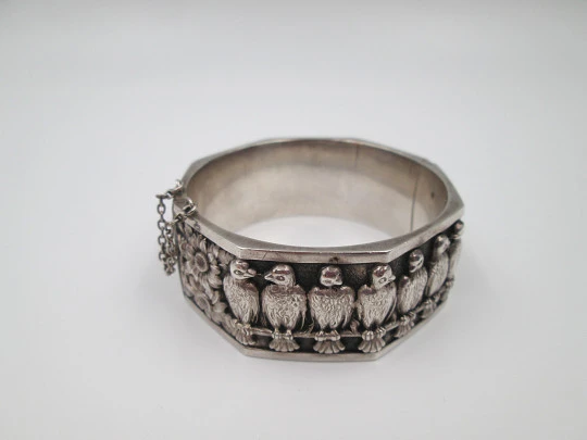 Women's wide bangle. Sterling silver. Daisies and eagles on high relief. Europe. 1970's Women's wide bangle. Sterling silver. Daisies and eagles on high relief. Europe. 1970's
