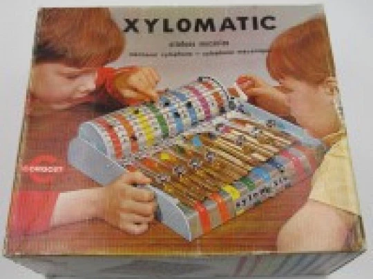 Xylomatic. Congost. Xilófono mecánico. Años 70. Hojalata y plástico