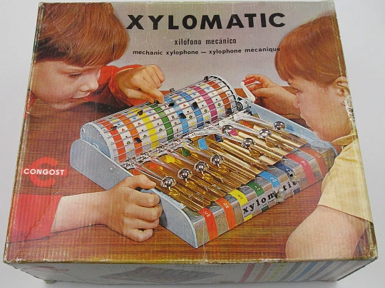 Xylomatic. Congost. Xilófono mecánico. Años 70. Hojalata y plástico