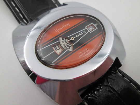 Yearling jump hours wristwatch. Chromed metal & steel. Manual wind. Date. 1970's