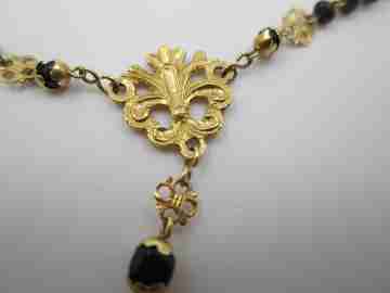 Yellow gold rosary and onyx beads. Openwork rosettes & crown. 1920's