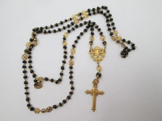 Yellow gold rosary and onyx beads. Openwork rosettes & crown. 1920's