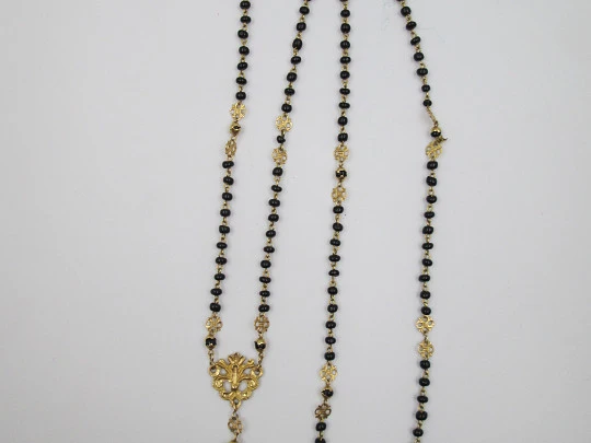 Yellow gold rosary and onyx beads. Openwork rosettes & crown. 1920's