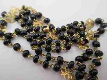 Yellow gold rosary and onyx beads. Openwork rosettes & crown. 1920's