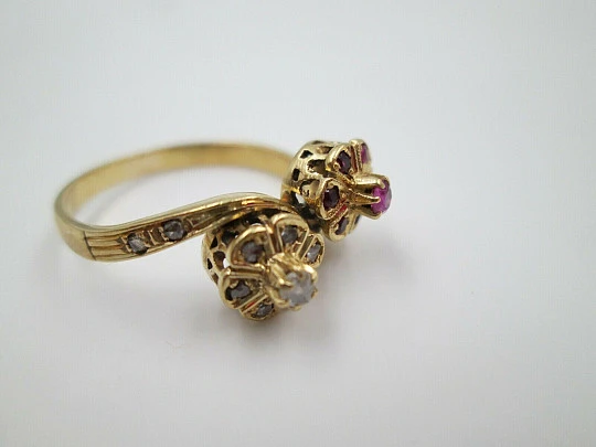 You & Me women's ring. 18 karat yellow gold. Rubies and diamonds. 1960's