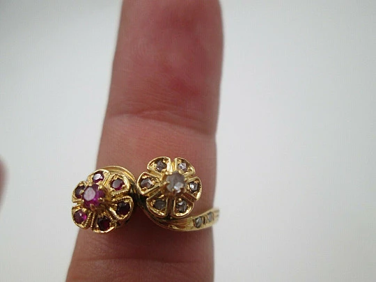 You & Me women's ring. 18 karat yellow gold. Rubies and diamonds. 1960's