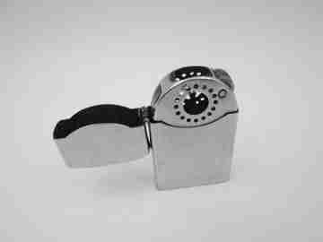 Zenith Windproof petrol pocket lighter. Chromed metal. Linear pattern. Japan. 1960's