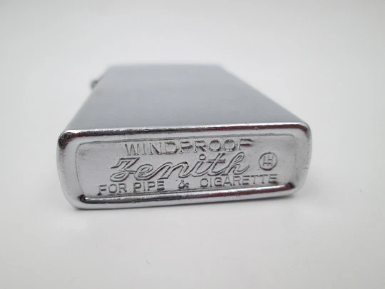 Zenith Windproof petrol pocket lighter. Chromed metal. Linear pattern. Japan. 1960's